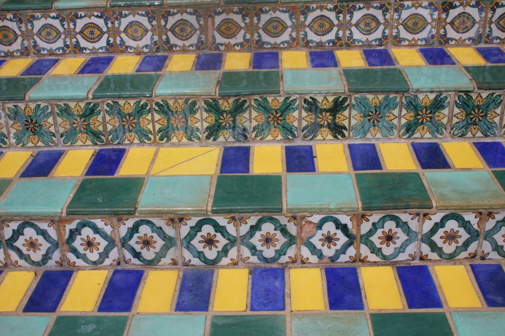 Butterfly gardens - Pan's garden in Palm beach also has architectural features like this tile wall
